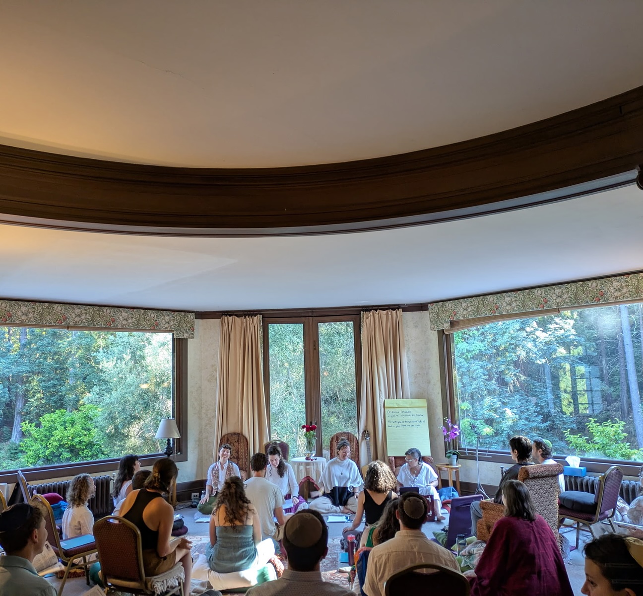 Jes Golden, Alison Cohen, Rebecca Schisler, and Kohenet haLev Fife leading chanting on IJS' silent young adult retreat in 2025